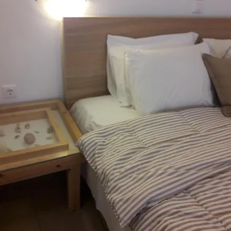 Apartahotel Heliotropio &